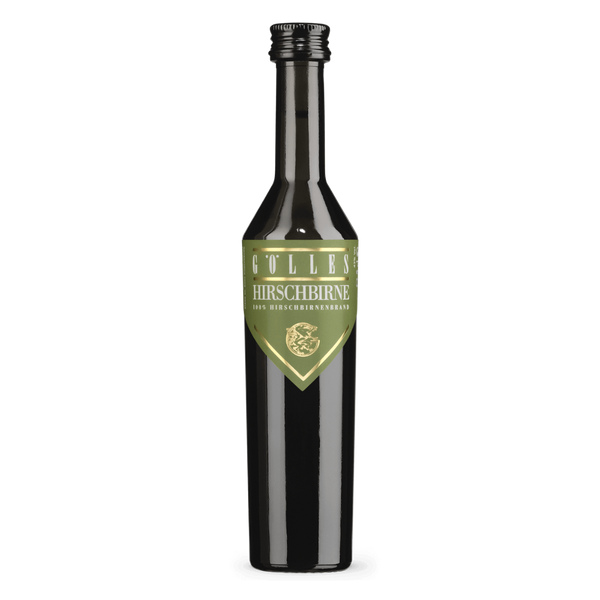 Gölles Birnenbrand Hirschbirne in schlanker dunkler Flasche mit grünem Etikett und goldenem Hirsch.