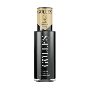 Gölles Apfel Balsamessig in zylindrischer Flasche mit schwarzem Etikett und beiger Kapsel.