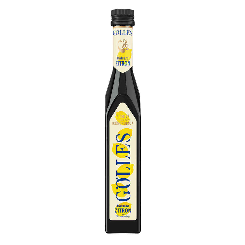 Gölles Balsam Zitron in schlanker Flasche mit zitronengelbem Etikett und schwarzem Verschluss.