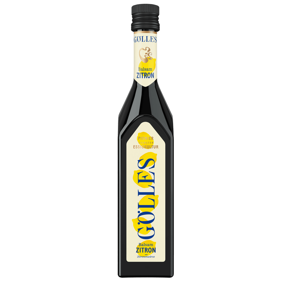 Gölles Balsam Zitron in schlanker Flasche mit zitronengelbem Etikett und schwarzem Verschluss.