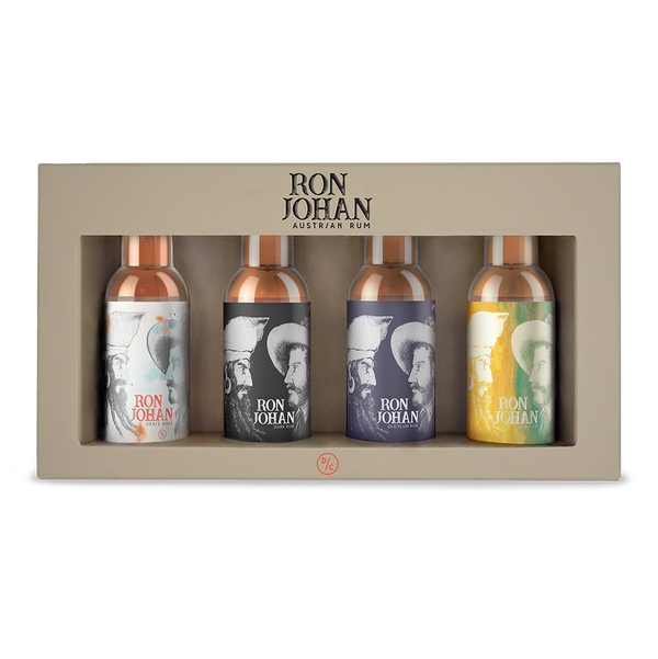 DAVID GÖLLES Best of Rum: Geschenkbox mit vier kleinen Flaschen Ron Johan Rum mit illustrierten Etiketten.