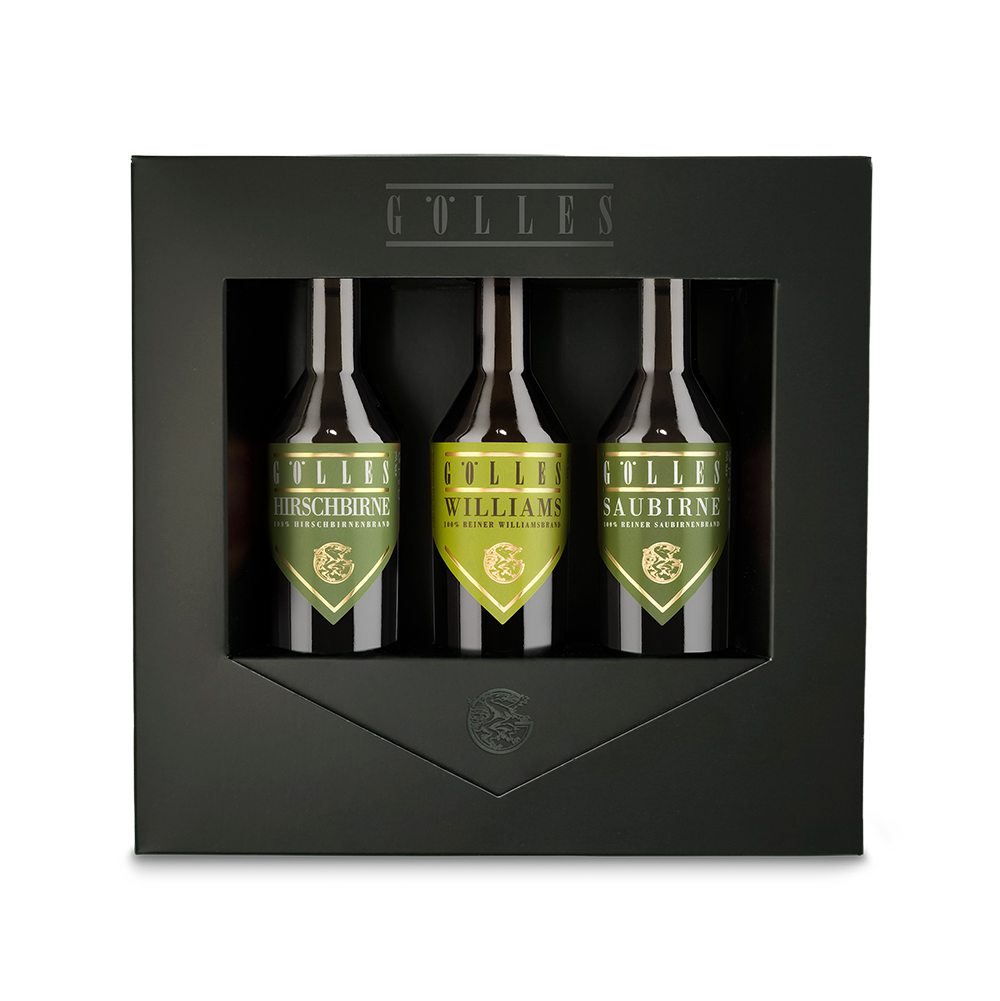 Gölles Trio Birne: drei Flaschen mit grünen Etiketten in schwarzer Geschenkbox.