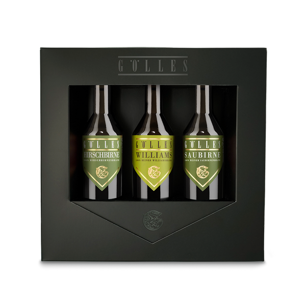 Gölles Trio Birne: drei Flaschen mit grünen Etiketten in schwarzer Geschenkbox.