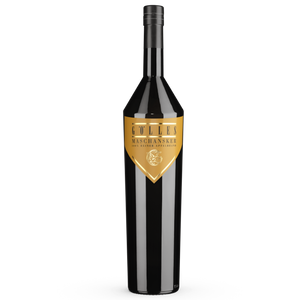 Gölles Apfelbrand Maschansker in schwarzer Flasche mit goldenem Dreiecksetikett und Apfelsymbol.