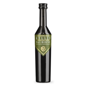 Gölles Birnenbrand Saubirne in dunkler Flasche mit grünem Etikett, weißer Schrift und goldenem Wappen.