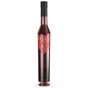 Gölles Weichsel Likör, rot, in schlanker Flasche mit goldener Schrift und rundem Emblem.