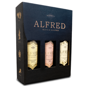 Gölles ALFRED Trio: drei Flaschen Wermut in schwarzer Geschenkbox mit Sichtfenstern.