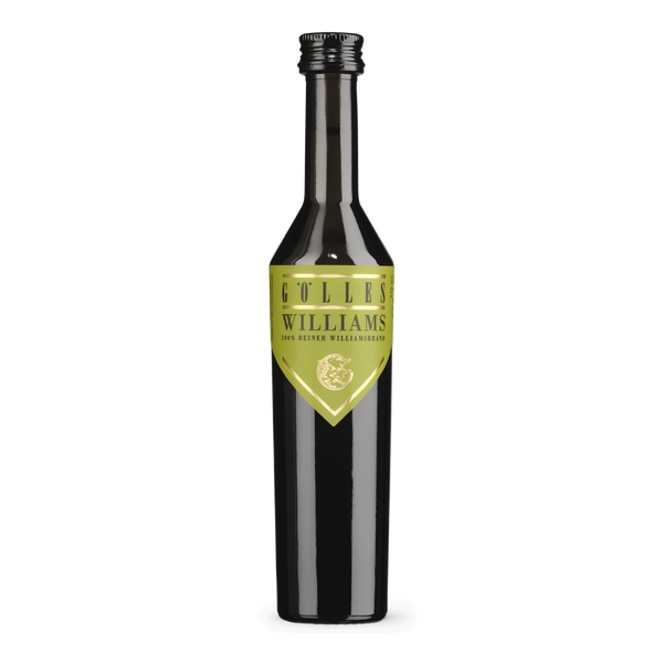 Gölles Birnenbrand Williams in schmaler schwarzer Flasche mit hellgrünem Schildetikett.