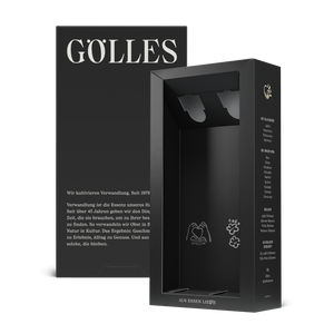 Leere schwarze Gölles Geschenkbox für zwei Flaschen mit Herzmotiv im Inneren.