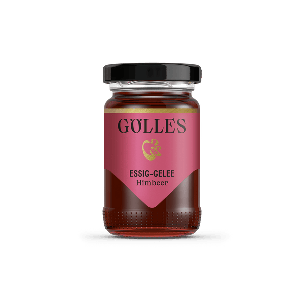 Gölles Essiggelee Himbeer, dunkelrot, in Glas mit schwarzem Deckel und rosa Etikett.