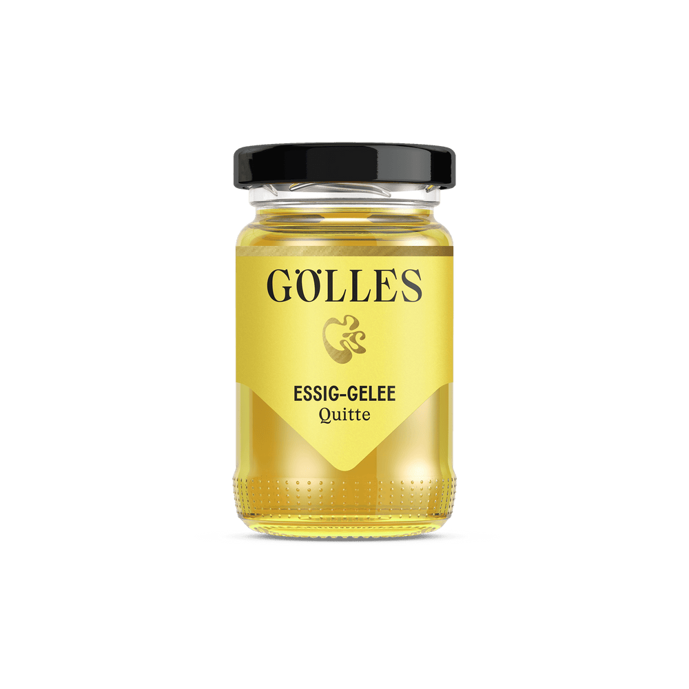 Gölles Essiggelee Quitte, gelb, in Glas mit schwarzem Deckel.