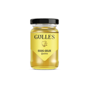 Gölles Essiggelee Quitte, gelb, in Glas mit schwarzem Deckel.