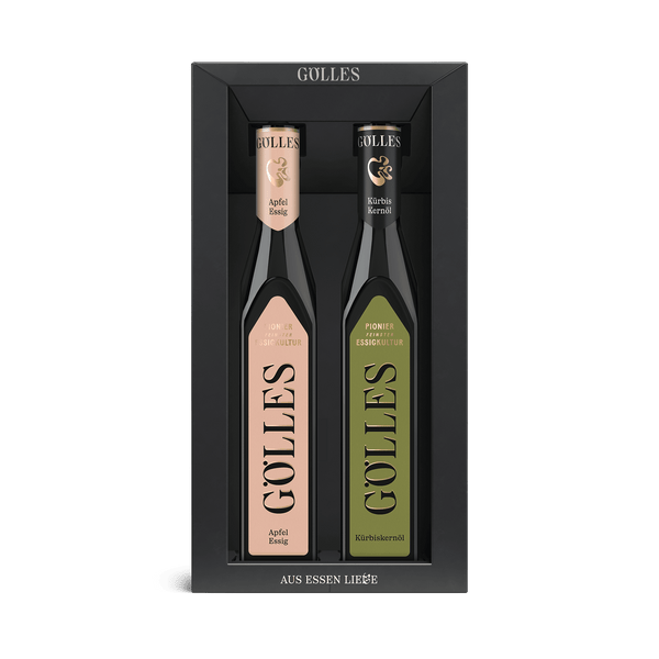 Gölles Duo Steirisch: Essig und Kürbiskernöl in schwarzer Geschenkverpackung.