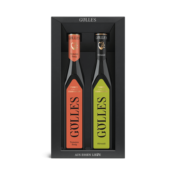 Gölles Duo Mediterran: Olivenöl und Tomaten Essig in schwarzer Geschenkbox.