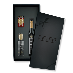 Gölles Set Apfel Balsam Trio: schwarze Geschenkbox mit Essiggelee und zwei Flaschen Apfel Balsamessig.