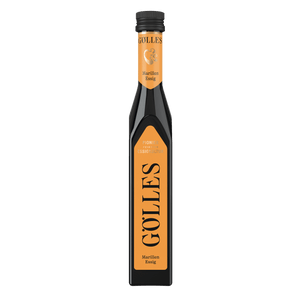 Gölles Marillen Essig in schlanker Flasche mit orangefarbenen Etiketten und schwarzem Verschluss.