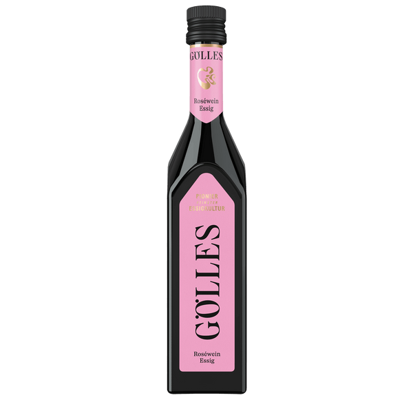 Gölles Roséwein Essig in hoher Flasche mit rosa Etiketten und schwarzem Verschluss.