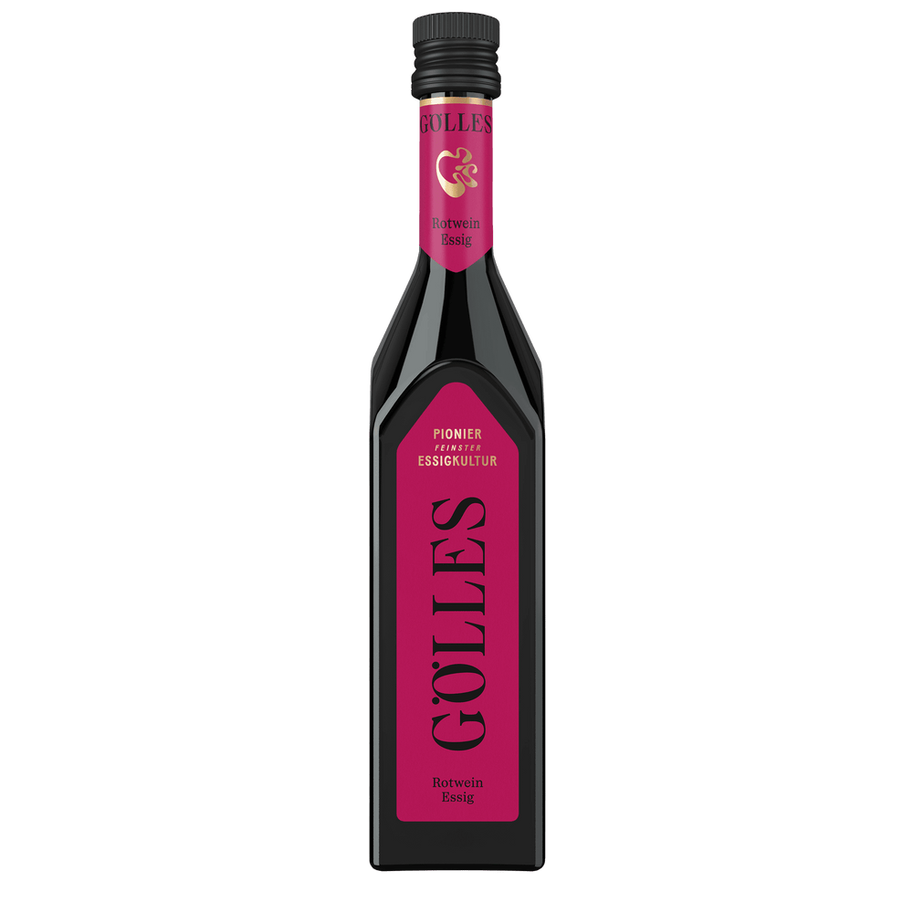 Gölles Rotwein Essig in eckiger Flasche mit pinkfarbenem Etikett und schwarzem Verschluss.