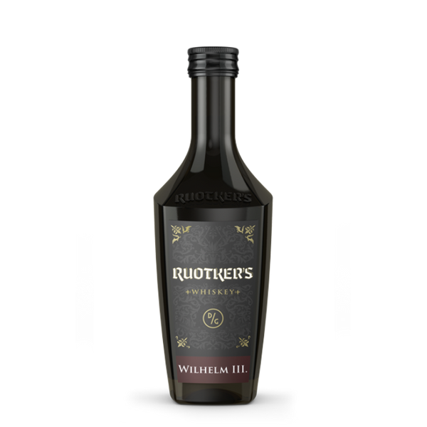 DAVID GÖLLES Ruotkers Wilhelm III in dunkler Flasche mit schwarzem, verziertem Etikett und rundem Emblem.