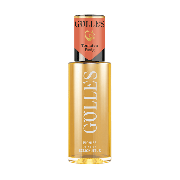 Gölles Tomaten Essig, goldgelb, in Glasflasche mit rotem Etikett.