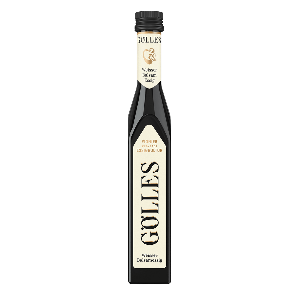 Gölles Weißer Balsamessig in Flasche mit beigen Etiketten und schwarzem Verschluss.