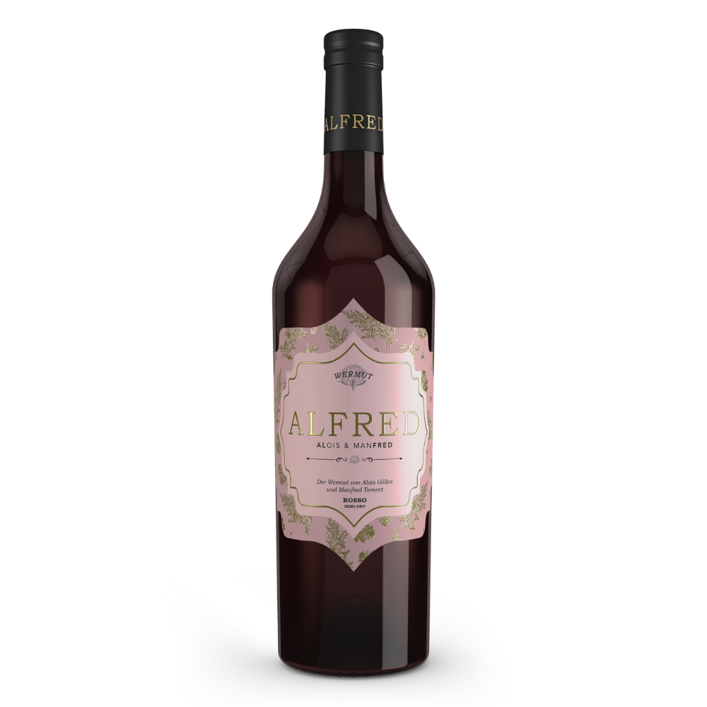 Gölles Wermut Alfred Rosso in Flasche mit rosa Etikett, goldener Schrift und floralem Muster.