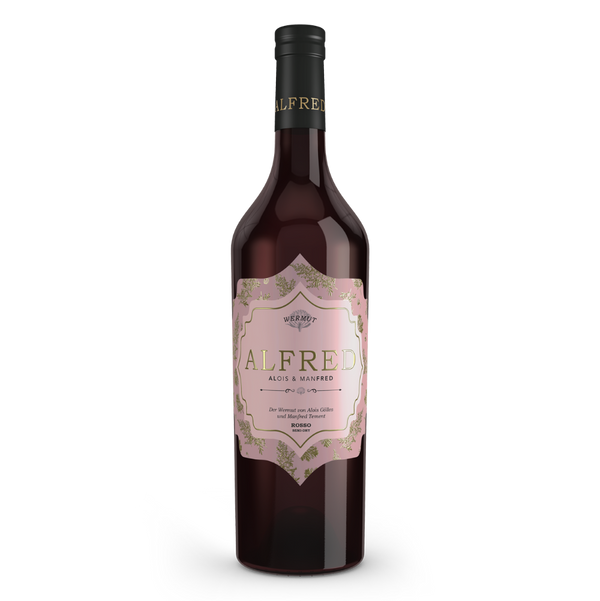 Gölles Wermut Alfred Rosso in Flasche mit rosa Etikett, goldener Schrift und floralem Muster.