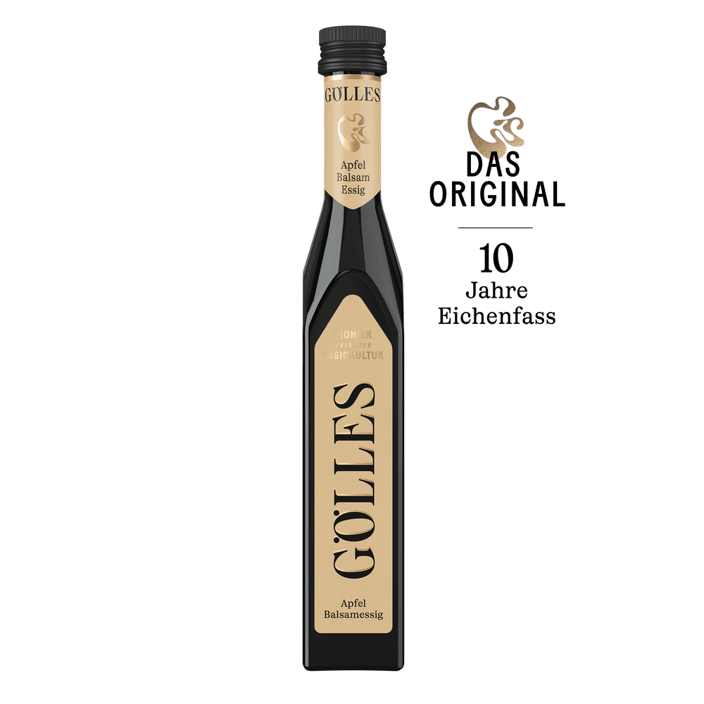 Gölles Apfel Balsamessig in schlanker Flasche mit schwarzem Verschluss und Eichenfass-Etikett.