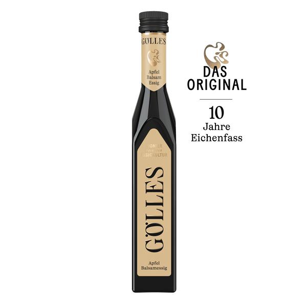 Gölles Apfel Balsamessig in schlanker Flasche mit schwarzem Verschluss und Eichenfass-Etikett.