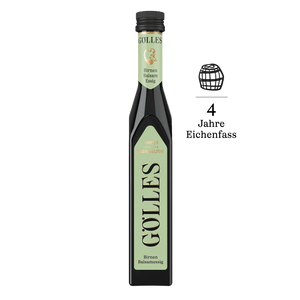 Gölles Birnen Balsamessig in schlanker Flasche mit hellgrünem Etikett und Fass-Symbol.